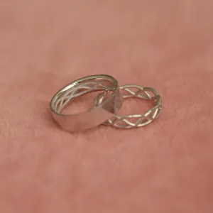 Crossed golden wedding rings JAS Thumbnail
