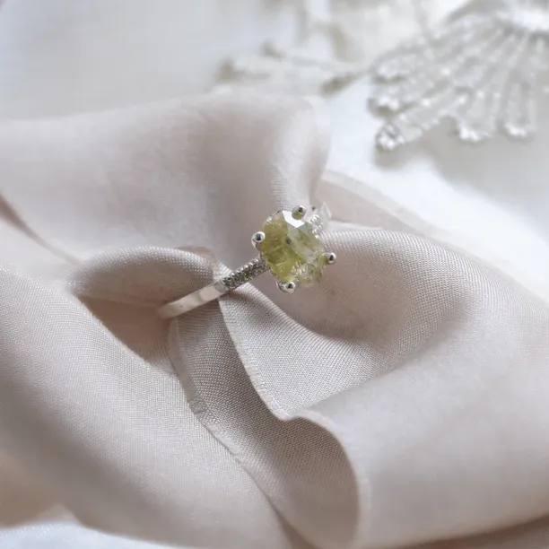 Gold engagement ring with salt and pepper diamond and side diamonds AILBHE Image