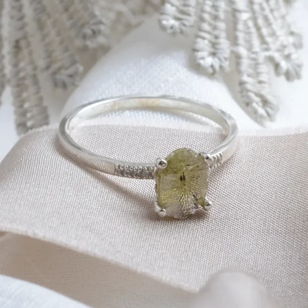 Gold engagement ring with salt and pepper diamond and side diamonds AILBHE Image