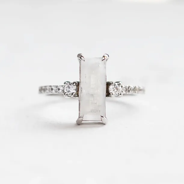Gold baguette moonstone ring with side diamonds TIGE Image