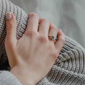 Halo gold ring with teal baguette sapphire and diamonds CELADON Thumbnail