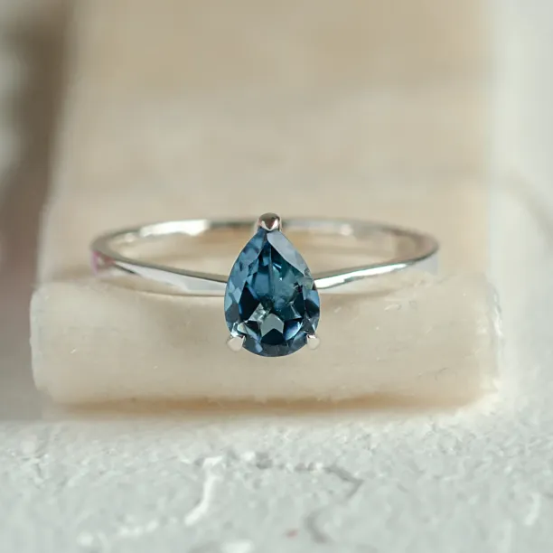 Gold ring with london blue topaz DROP Image