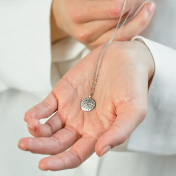 Gold necklace with zodiac sign and unusual surface NALA Image