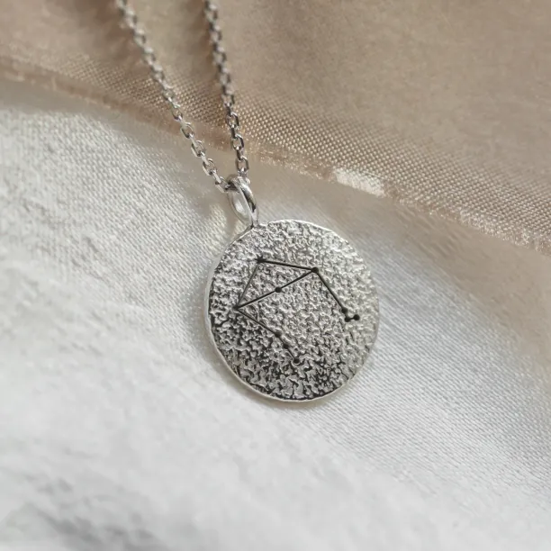 Gold necklace with zodiac sign and unusual surface NALA Image