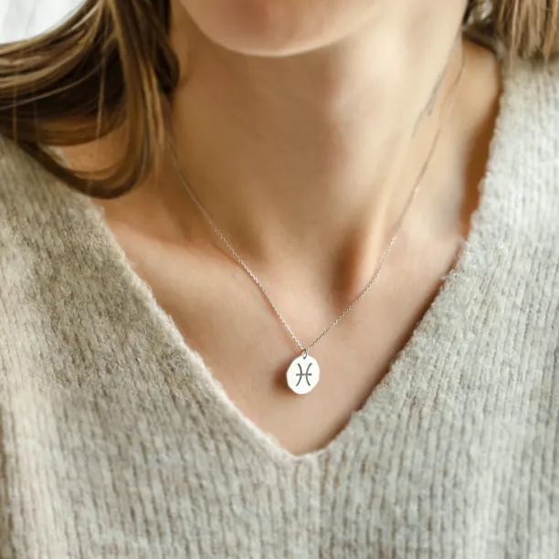 Gold necklace with sign AURELIA Image