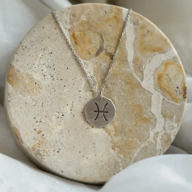 Gold necklace with sign AURELIA Image