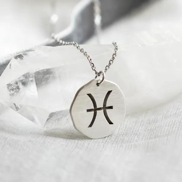 Gold necklace with sign AURELIA Image