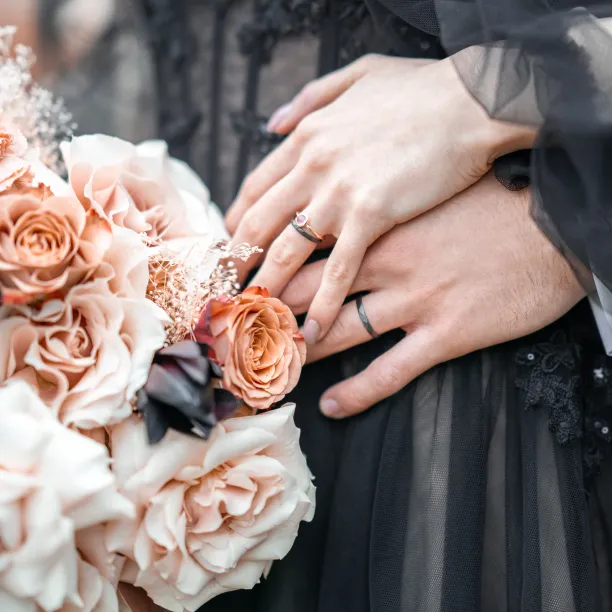Black wedding bands in gold with hammered surface AZTEK Image
