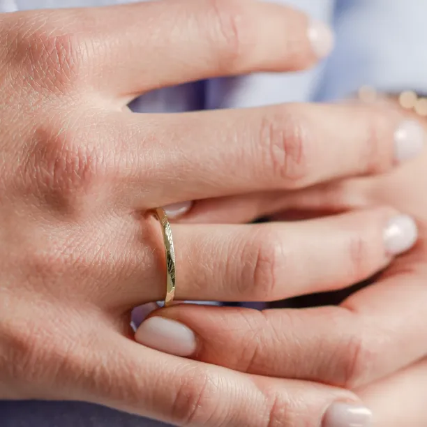 Gold hammered wedding rings BOMM Image