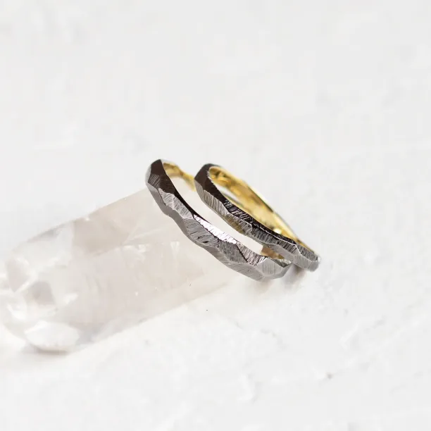 Black hammered wedding bands in organic shape GOLEM Image