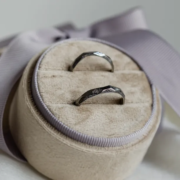 Black hammered wedding bands in organic shape GOLEM Image