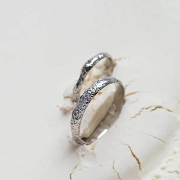 Gold wedding bands with moon surface APOLLO Image