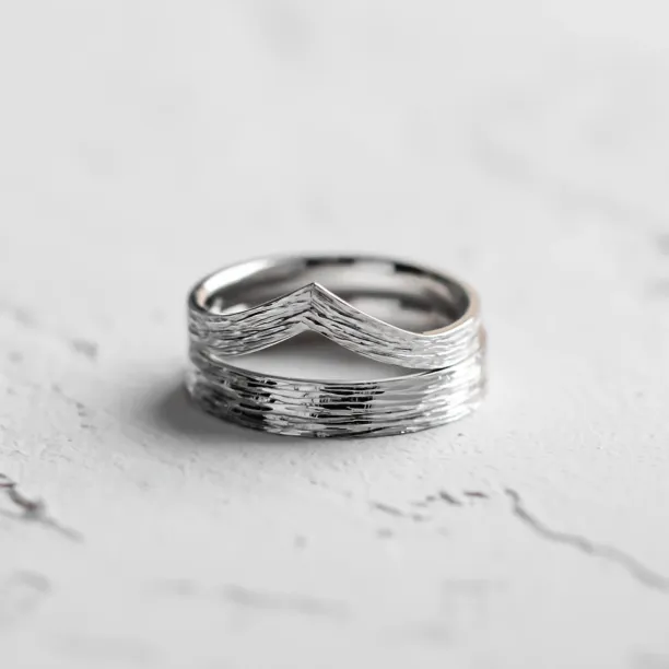 Gold wedding rings with natural surface SIENA Image