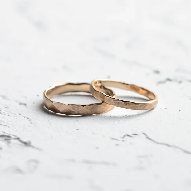 Matte gold wedding bands with hammered surface ETAIN Image