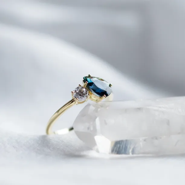 Toi et Moi engagement ring with blue pear sapphire and round diamond COUPLE Image