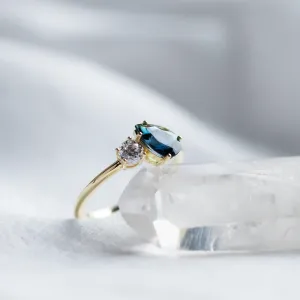 Toi et Moi engagement ring with blue pear sapphire and round diamond COUPLE Thumbnail