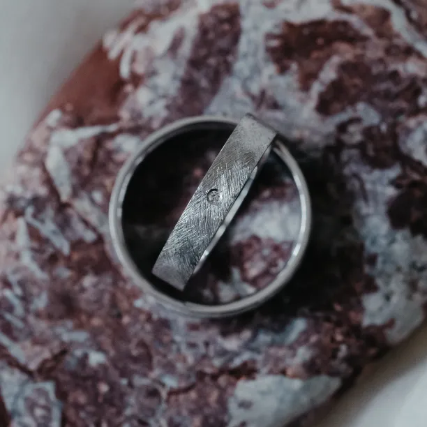 Wedding rings with matte finish with a diamond TOFA Image