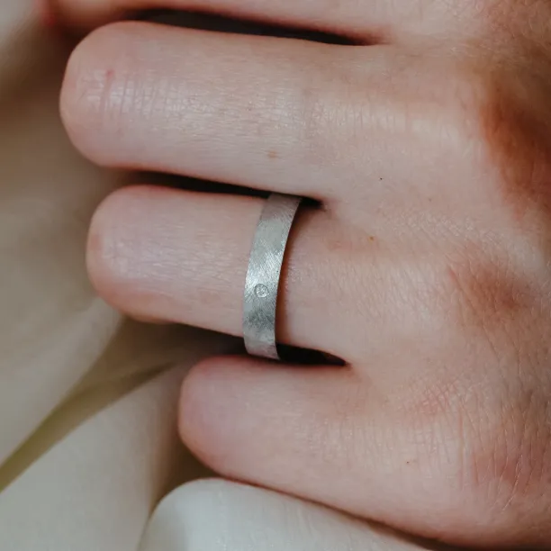 Wedding rings with matte finish with a diamond TOFA Image