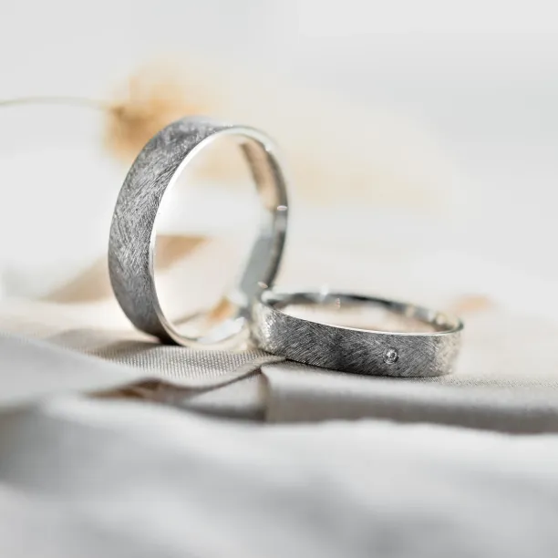 Wedding rings with matte finish with a diamond TOFA Image