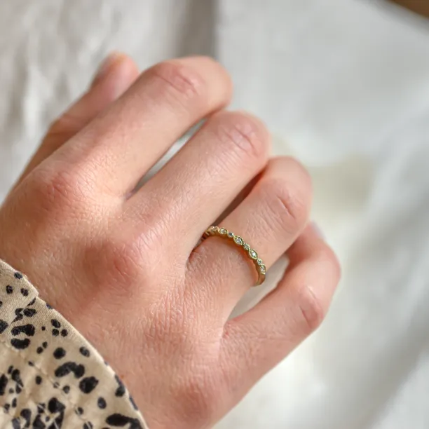 Unusual wedding rings with diamonds in vintage style LAZZI Image