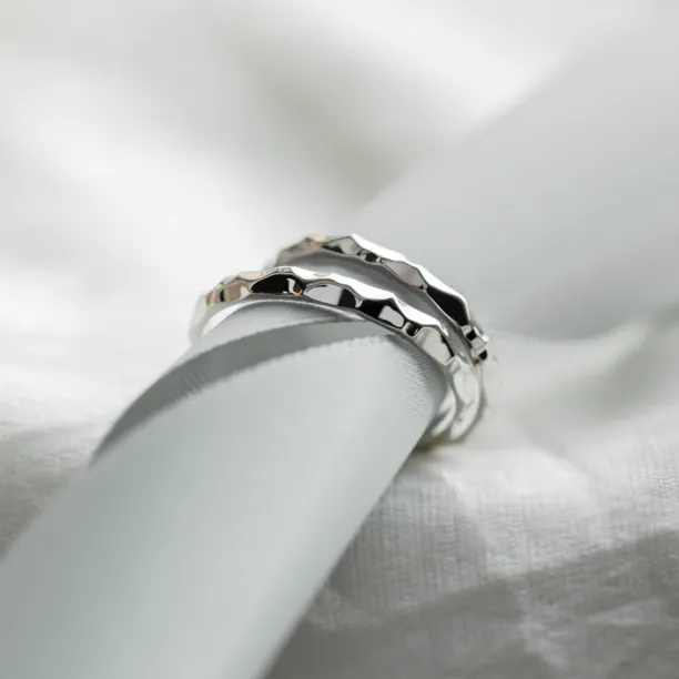 Unusual wedding rings with a shiny ESTELA Image