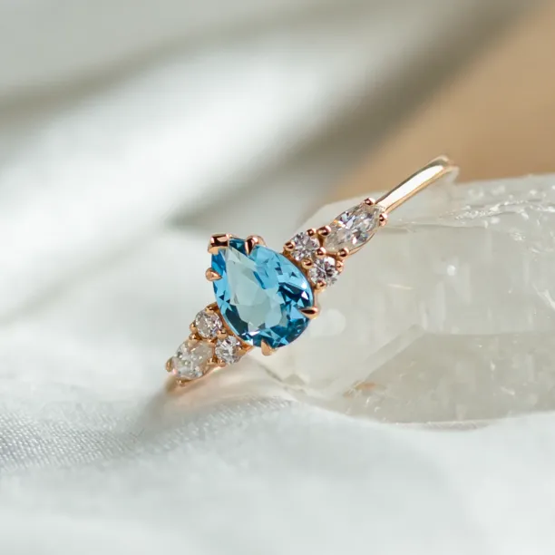 Gold ring with topaz and moissanites ASTROS Image
