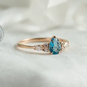 Gold ring with topaz and moissanites ASTROS Thumbnail