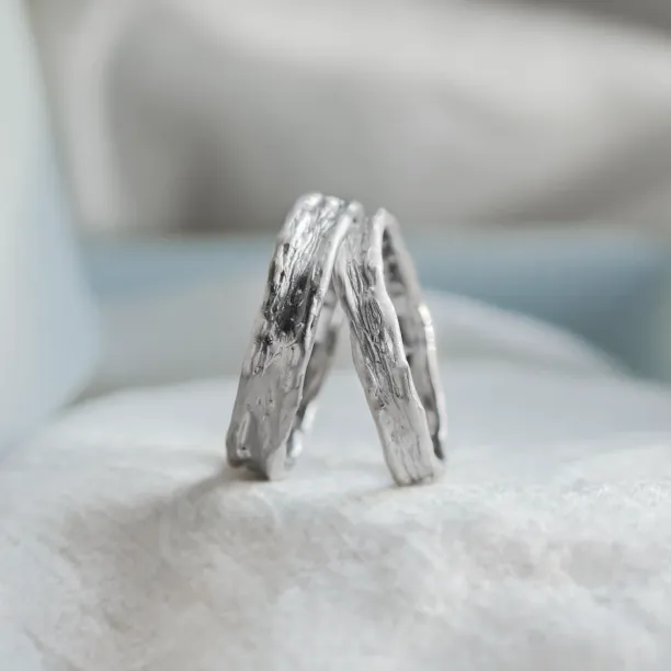 Unusual wedding rings with natural surface ARETA Image