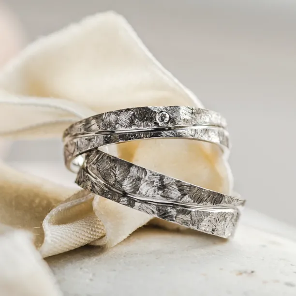 Gold wedding rings with scratched surface LUGO Image