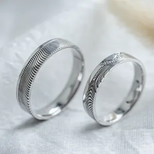 Wedding rings with abstract relief and diamonds OMEGA Thumbnail