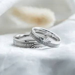 Wedding rings with abstract relief and diamonds OMEGA