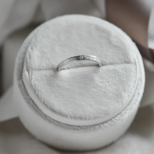 Original wedding ring with tree bark surface NIXON Image