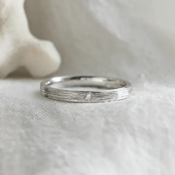 Original wedding ring with tree bark surface NIXON Image