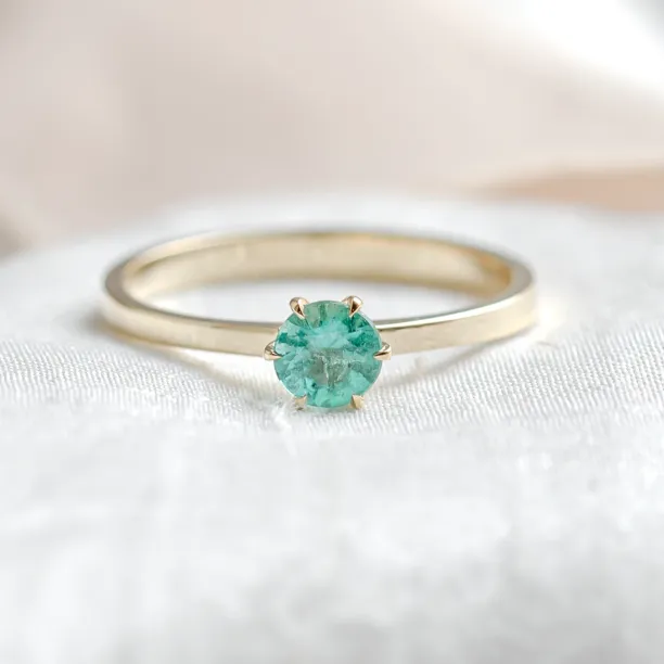 Gold engagement ring with emerald JADE Image