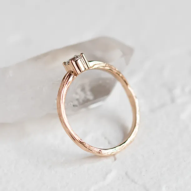 Atypical engagement ring with diamond and tree bark surface RIA Image