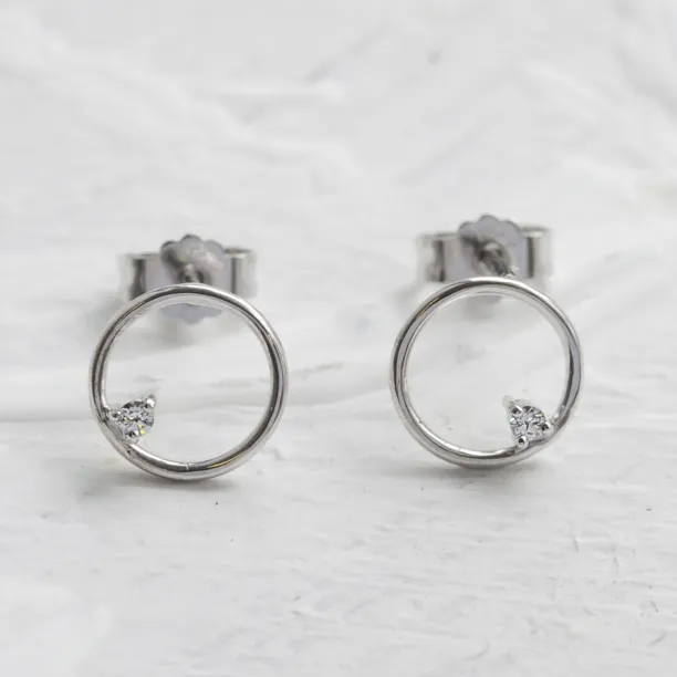 Gold karma earrings with diamonds GARURASANA Image