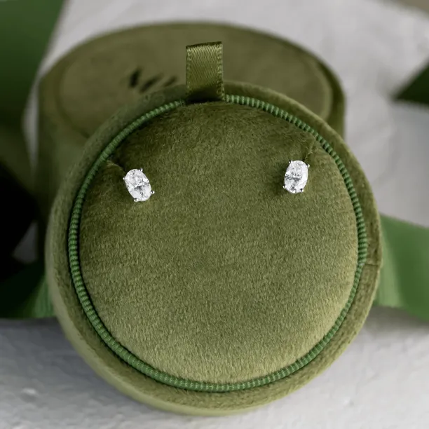 Gold minimalist earrings with oval lab-grown diamonds CARO Image