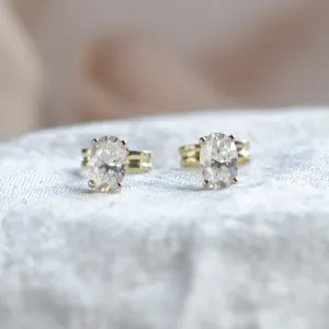 Gold minimalist earrings with oval moissanites CAROLYNE Thumbnail