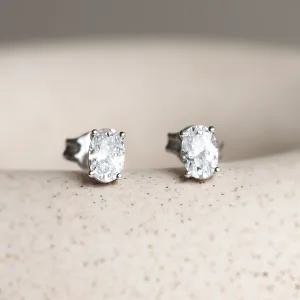 Gold minimalist earrings with oval moissanites CAROLYNE