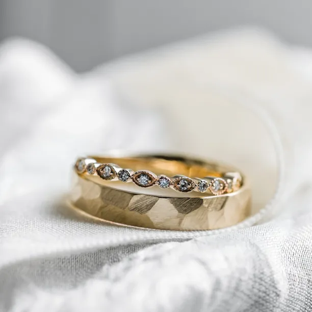 Gold diamond wedding rings LATI Image