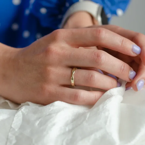 Gold wedding rings with bow tie shape LALI Image