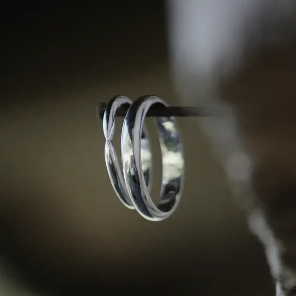 Gold wedding rings with bow tie shape LALI Image