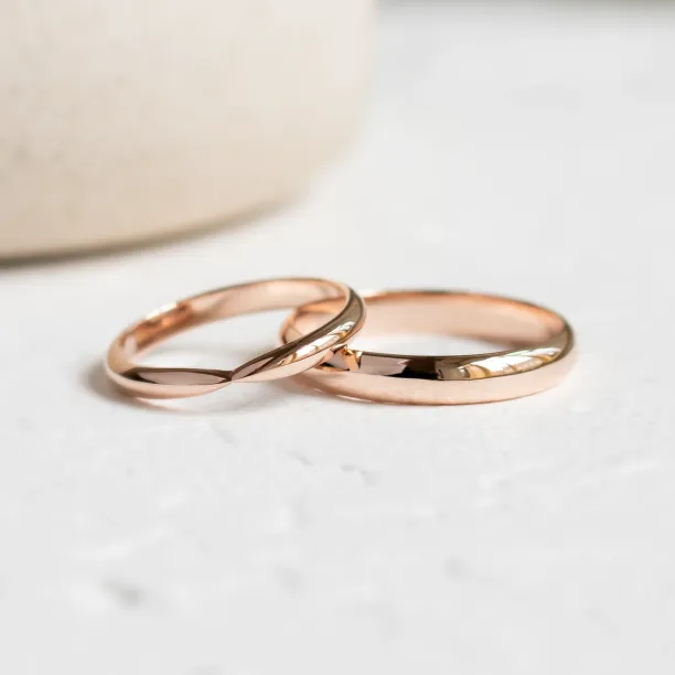 Gold wedding rings with bow tie shape LALI Image