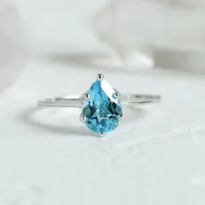 Gold ring with blue topaz OLLY