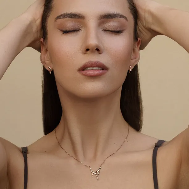 Minimalist gold earrings waves MIGNON Image