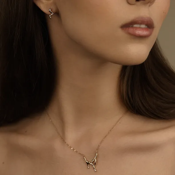 Minimalist gold earrings waves MIGNON Image