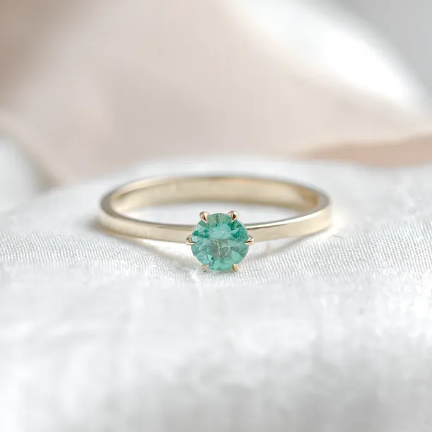 Gold engagement ring with emerald JADE Image