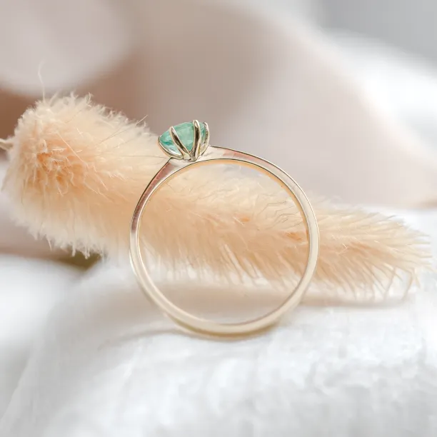 Gold engagement ring with emerald JADE Image