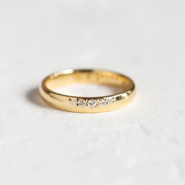 Gold wedding rings with diamonds NICOS Image
