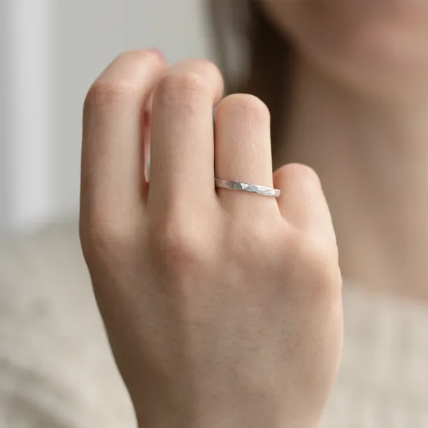 Matte platinum wedding bands with hammered surface ETA Image